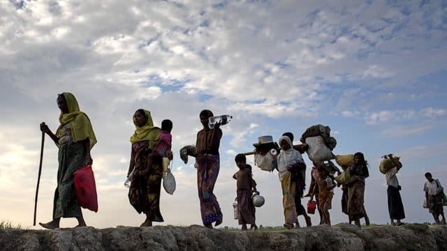 Rohingya-Flüchtlinge in Bangladesch: Der UN-Migrationspakt soll Flüchtlingen besseren Zugang zu Schulen, Arbeit und Gesundheitsversorgung verschaffen. Rohingya-Flüchtlinge in Bangladesch: Der UN-Migrationspakt soll Flüchtlingen besseren Zugang zu Schulen, Arbeit und Gesundheitsversorgung verschaffen.