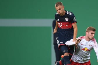 Könnten am Mittwoch wieder aufeinandertreffen: Bayerns Joshua Kimmich (l) und der Leipziger Timo Werner.