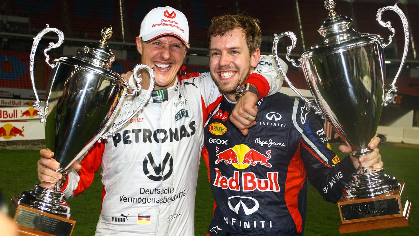 Verstehen sich gut: Michael Schumacher (l.) und Sebastian Vettel.
