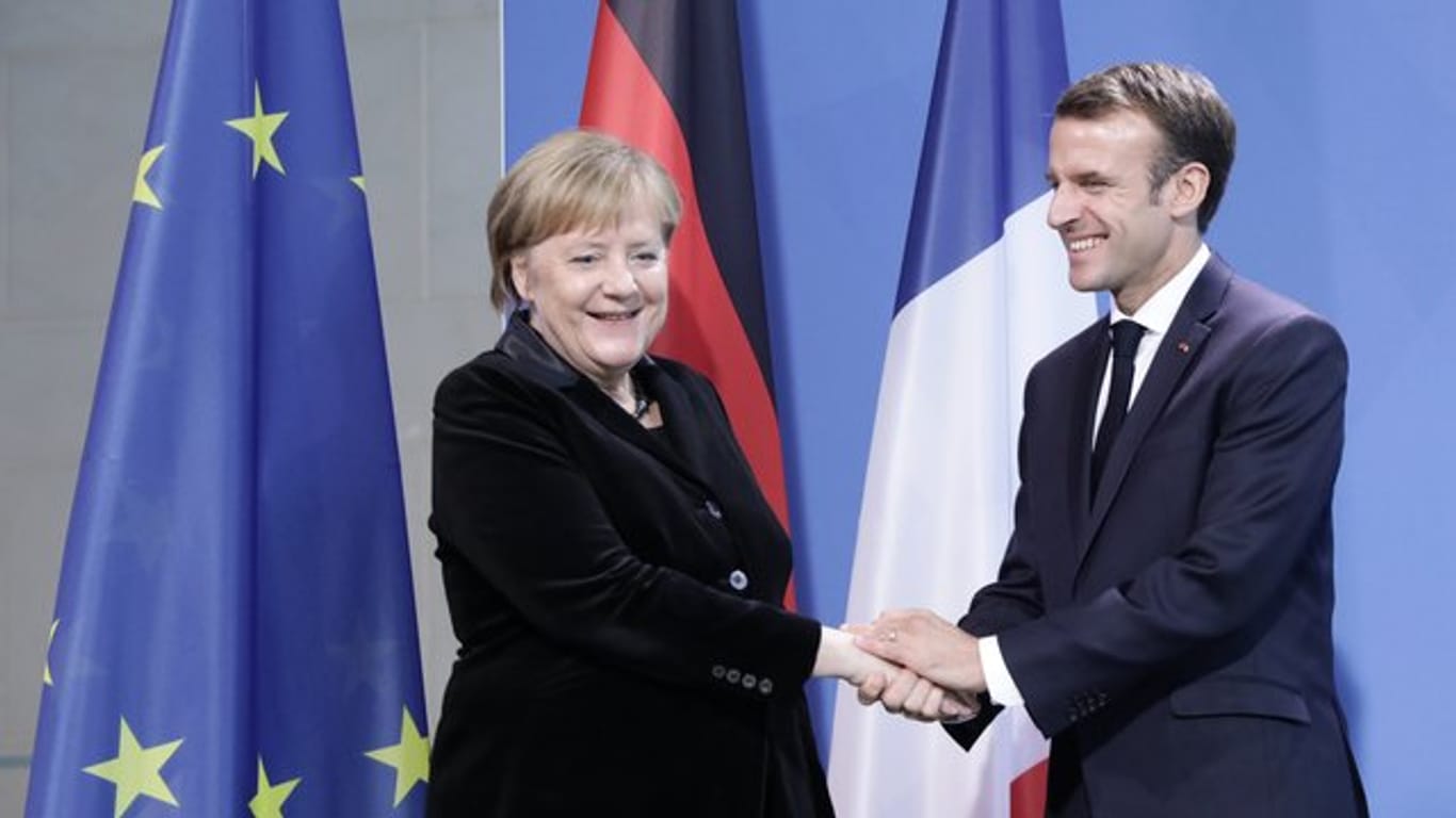Angela Merkel (CDU) und Emmanuel Macron wollen in Aachen einen neuen Freundschaftspakt besiegeln.