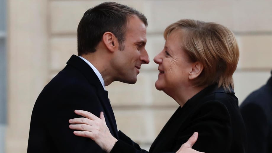 Emmanuel Macron, Angela Merkel.