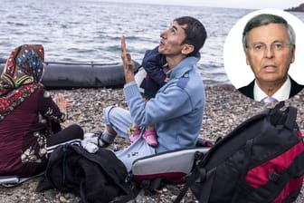 Ein Flüchtling mit Frau und Kind nach seiner Ankunft auf der griechischen Insel Lesbos 2015: Die Union muss klare Antworten auf wichtige Fragen der Asyl- und Migrationspolitik finden, fordert CDU-Politiker Wolfgang Bosbach.