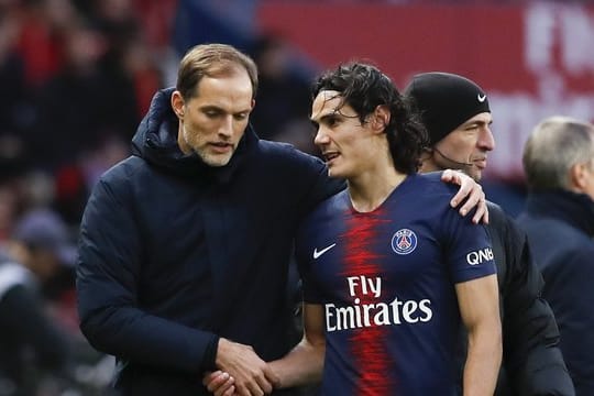 Trainer Thomas Tuchel (l) und Torschütze Cavani.