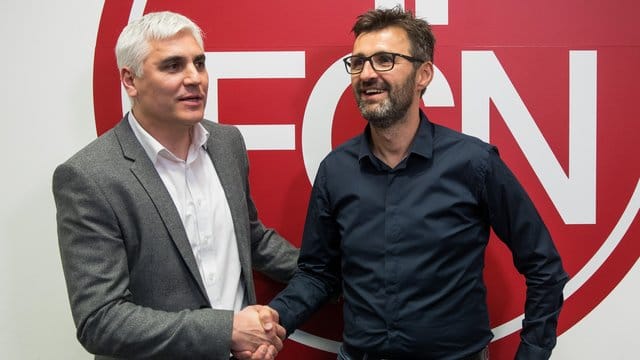 Trainer Michael Köllner (r) und Sportvorstand Andreas Bornemann.