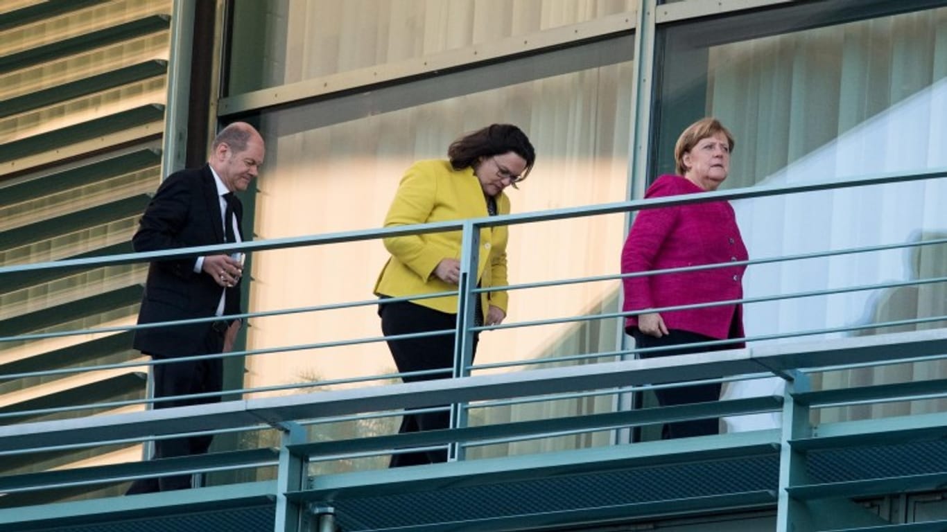 Scholz, Nahles, Merkel auf dem Balkon des Kanzleramts.