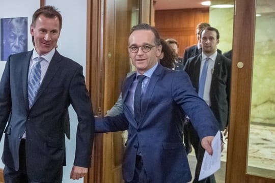 Bundesaußenminister Heiko Maas und sein britischer Amtskollege Jeremy Hunt (l) in Berlin.
