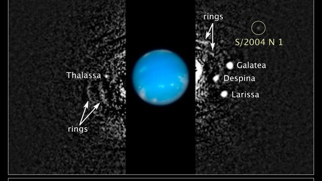 Das NASA-Handout zeigt eine zusammengesetzte Aufnahme des Hubble-Weltraumteleskops vom Neptun und seiner Monde. Das NASA-Handout zeigt eine zusammengesetzte Aufnahme des Hubble-Weltraumteleskops vom Neptun und seiner Monde.