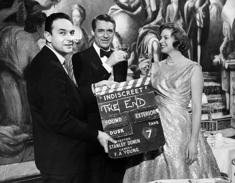 Im Februar 1958: Stanley Donen mit Cary Grant und Ingrid Bergmann.