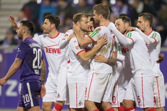 Erleichterung: Die Spieler des 1. FC Köln freuen sich über das goldene Tor.