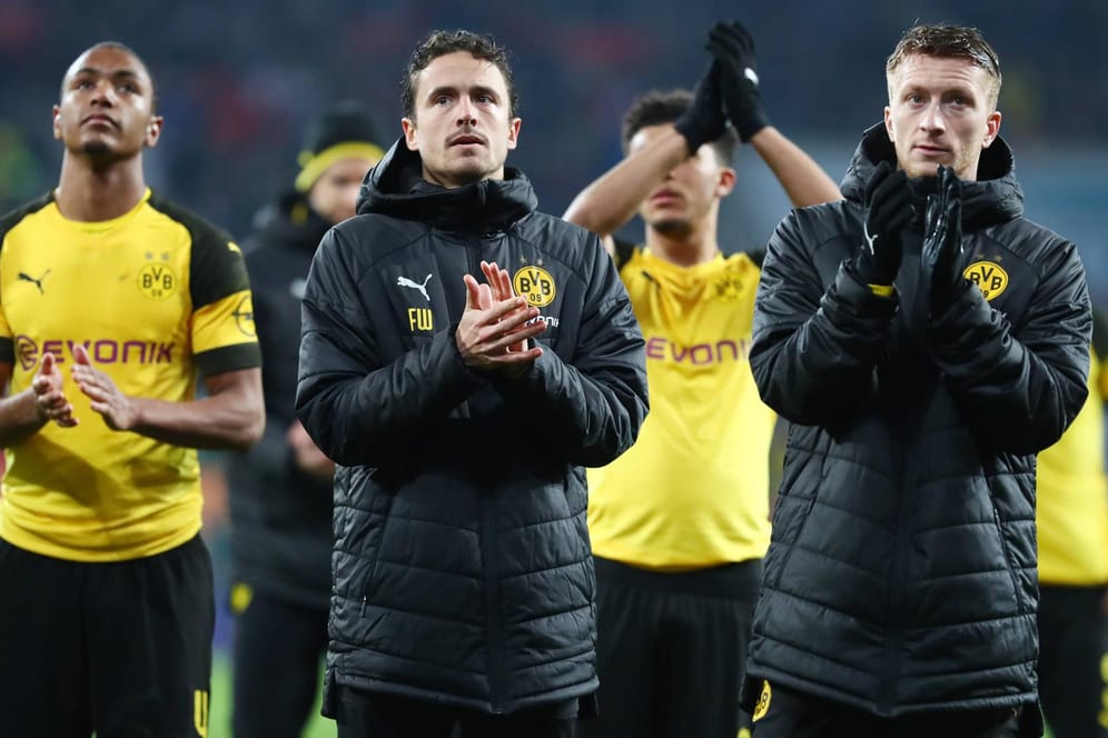 Die Dortmunder Abdou Diallo, Thomas Delaney und Marco Reus (v.l.n.r.) konnten am Freitag in Augsburg nicht punkten.