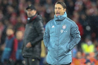 Unter Druck: Bayern-Trainer Niko Kovac (vorn) und sein Liverpool-Kollege Jürgen Klopp (hinten).