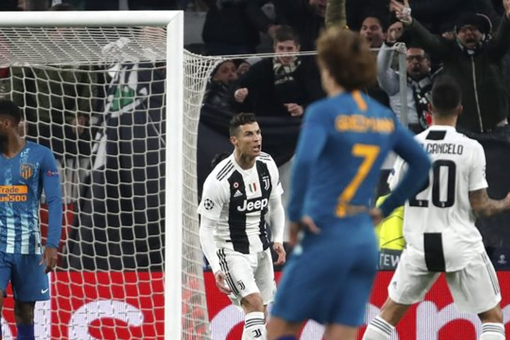 Cristiano Ronaldo (M) feiert das 1:0 für Juve gegen Atlético Madrid.