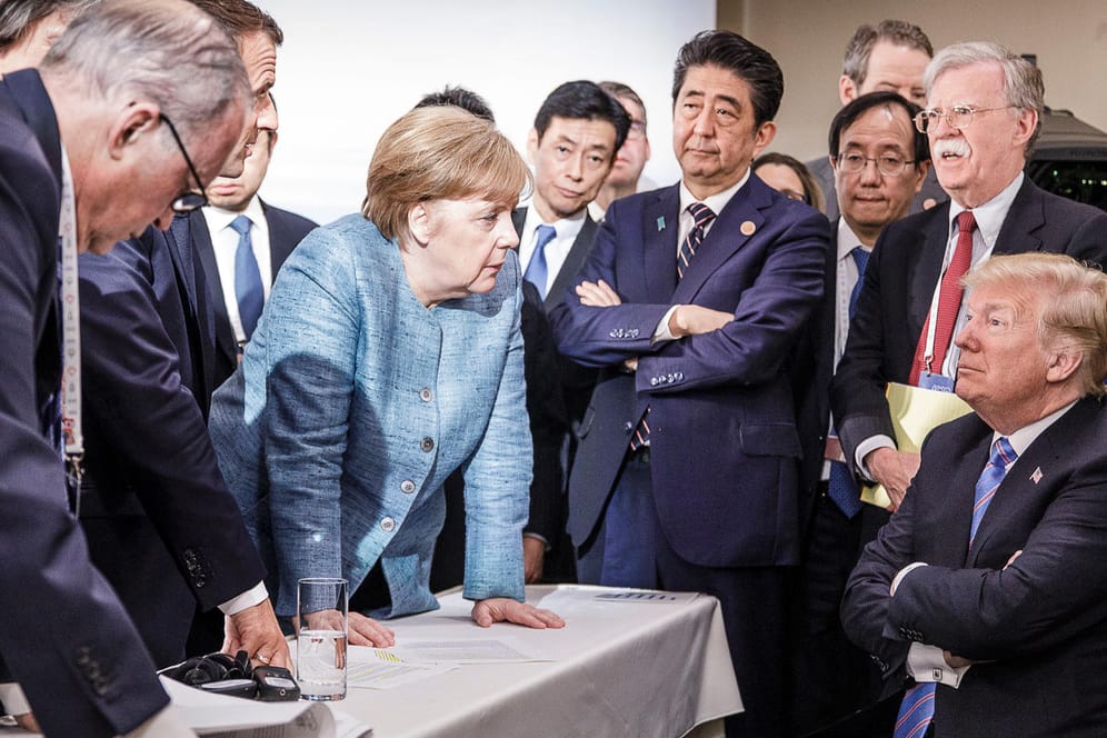 Merkel im Gespräch mit US-Präsident Trump auf dem G7-Gipfel in Charlevoix, Kanada: Trumps Wahl soll ein Grund für sie gewesen sein, noch einmal als Kanzlerin anzutreten.