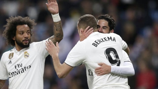 Isco (r), Benzema und Marcelo (l) jubeln über das erste Tor der Madrilenen. Isco (r), Benzema und Marcelo (l) jubeln über das erste Tor der Madrilenen.