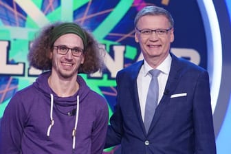 Mögen beide Kekse: Moderator Günther Jauch und Tobias Pietsch.