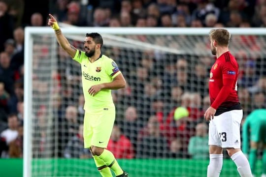 Barcas Luis Suarez feiert sein entscheidendes Tor in Manchester.