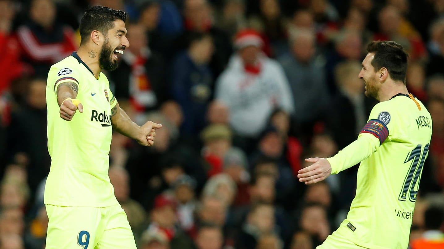 Jubel bei Luis Suarez (l.) und Lionel Messi: Der FC Barcelona siegte bei Manchester United.