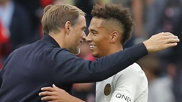PSG-Trainer Thomas Tuchel und sein Spieler Thilo Kehrer sind französischer Meister. PSG-Trainer Thomas Tuchel und sein Spieler Thilo Kehrer sind französischer Meister.