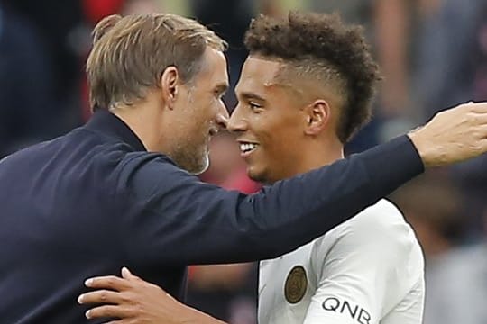 PSG-Trainer Thomas Tuchel und sein Spieler Thilo Kehrer sind französischer Meister.