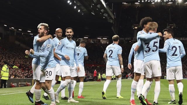 Die Spieler von Manchester City jubeln. Die Spieler von Manchester City jubeln.