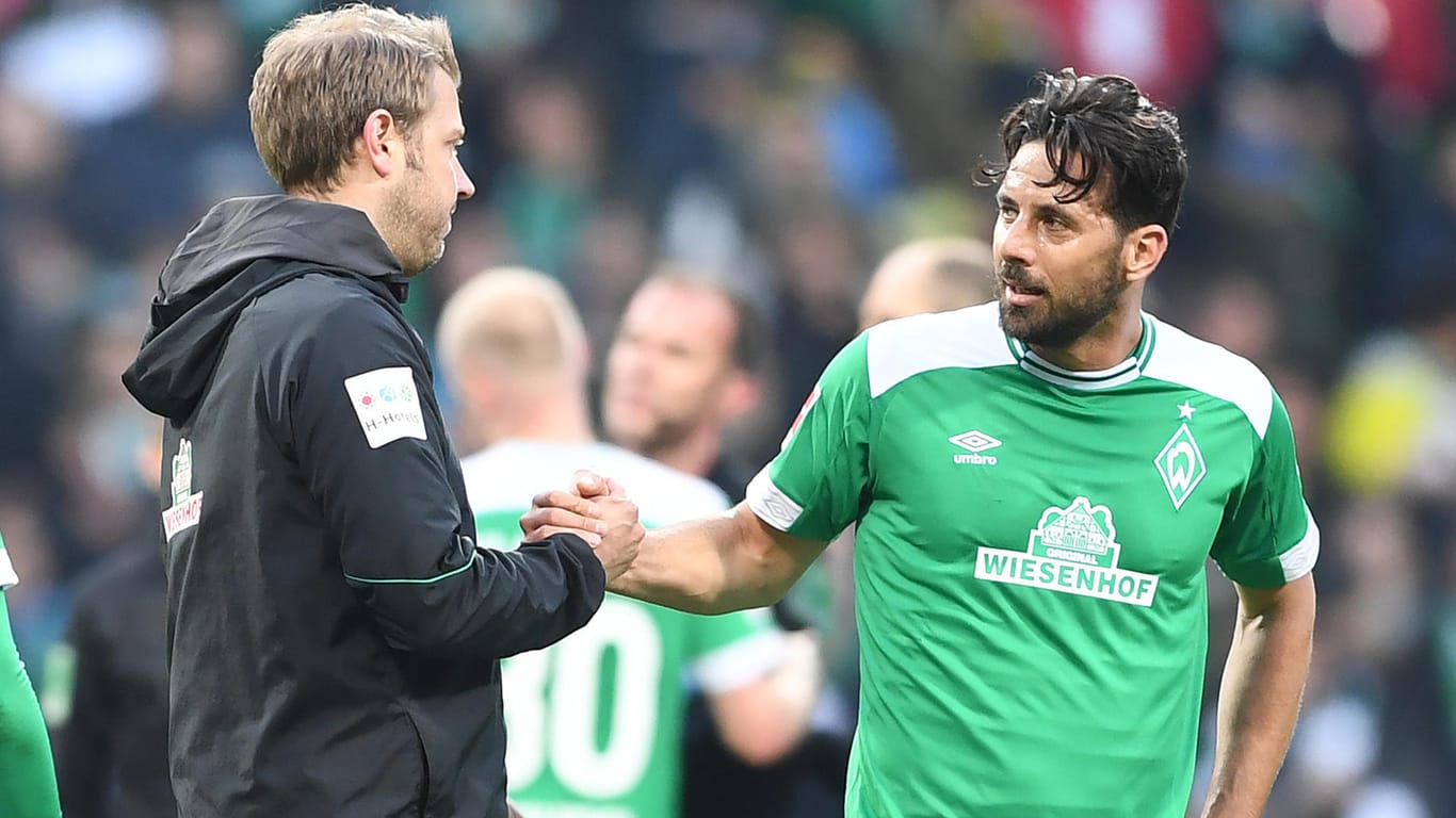 Pizarro (r.) und Bremens Trainer Kohfeldt nach dem 2:2 gegen Borussia Dortmund.