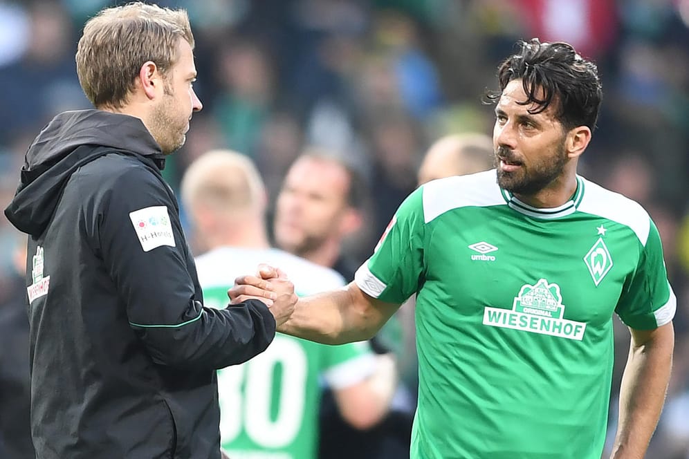 Pizarro (r.) und Bremens Trainer Kohfeldt nach dem 2:2 gegen Borussia Dortmund.
