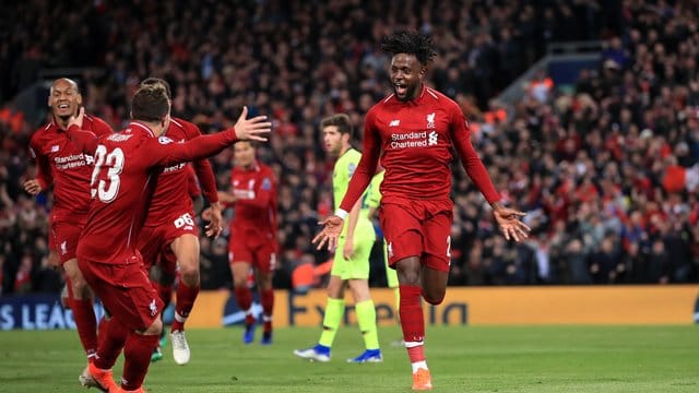 Liverpools Divock Origi (r) jubelt über sein zweites Tor zum 4:0-Sieg gegen den FC Barcelona. Liverpools Divock Origi (r) jubelt über sein zweites Tor zum 4:0-Sieg gegen den FC Barcelona.
