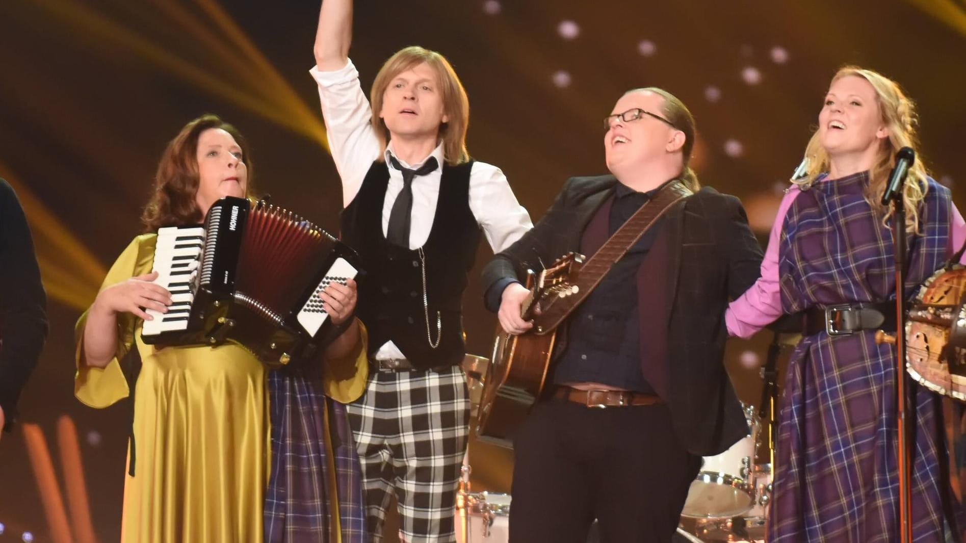 Kathy, Johnny, Angelo und Patricia Kelly bei einem Auftritt nach der Reunion.