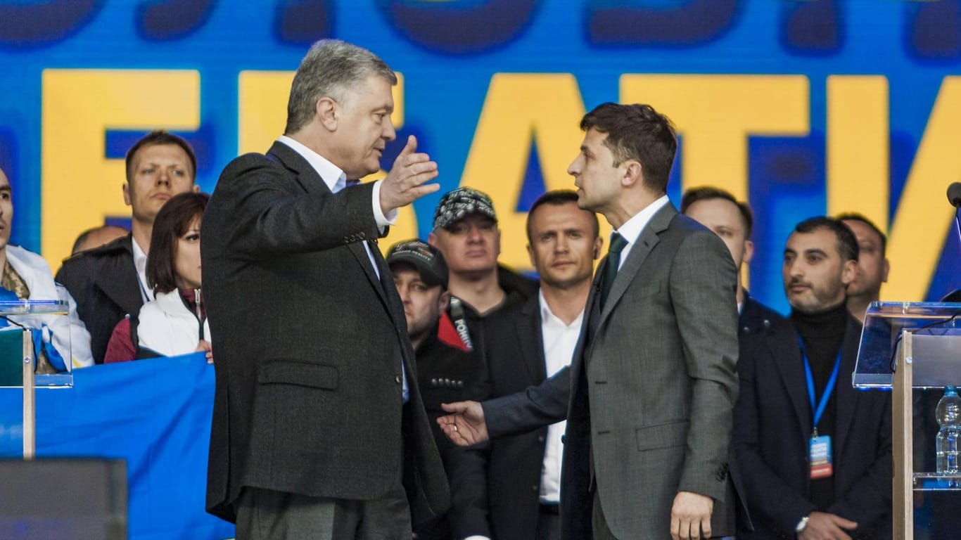 Der scheidende Präsident Petro Poroshenko und Wolodymyr Zelenskiy: Neuwahlen würden der Partei des neuen Staatschefs helfen.