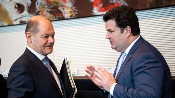 Finanzminister Olaf Scholz (l) und Sozialminister Hubertus Heil in Berlin.