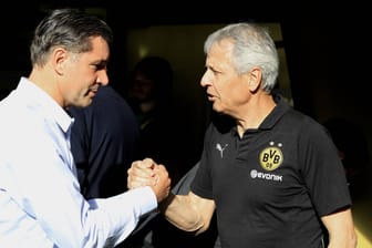 Michael Zorc (l.) und Lucien Favre: Dortmunds Sportdirektor will offenbar mit seinem Coach verlängern.