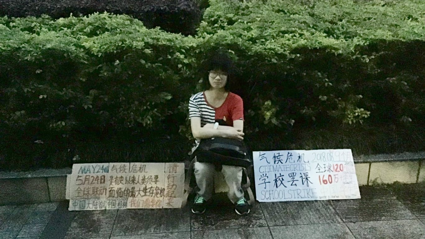 Ende nicht absehbar: Howey Ou will an einem Platz vor dem früheren Regierungsgebäude auf den Klimastreik aufmerksam machen, bis Chinas Regierung weitreichende Versprechen macht.