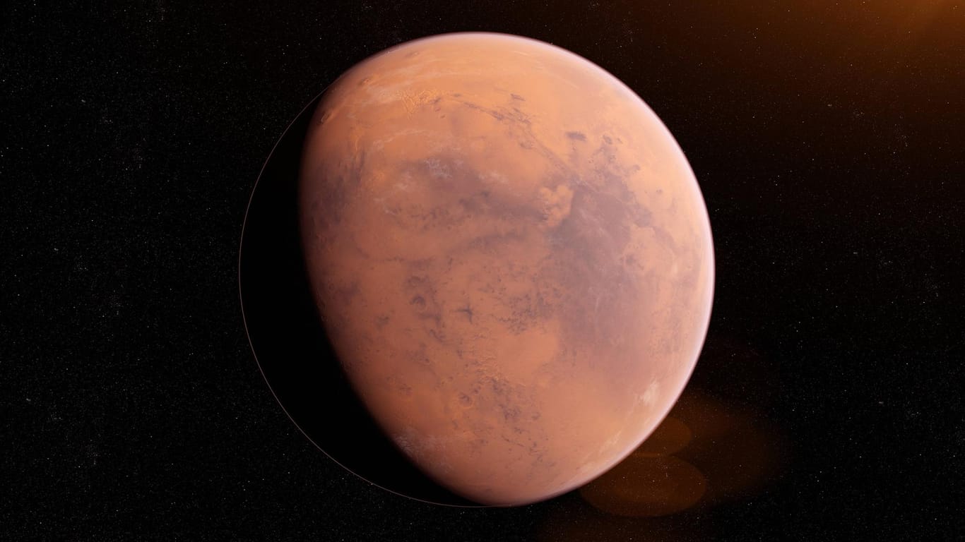 Illustration vom Mars: Zu Monatsbeginn geht der Ringplanet kurz vor Mitternacht im Südosten auf.