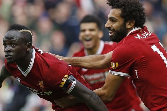 Der FC Liverpool setzt auf die Tore von Sadio Mané (l) und Mohamed Salah.