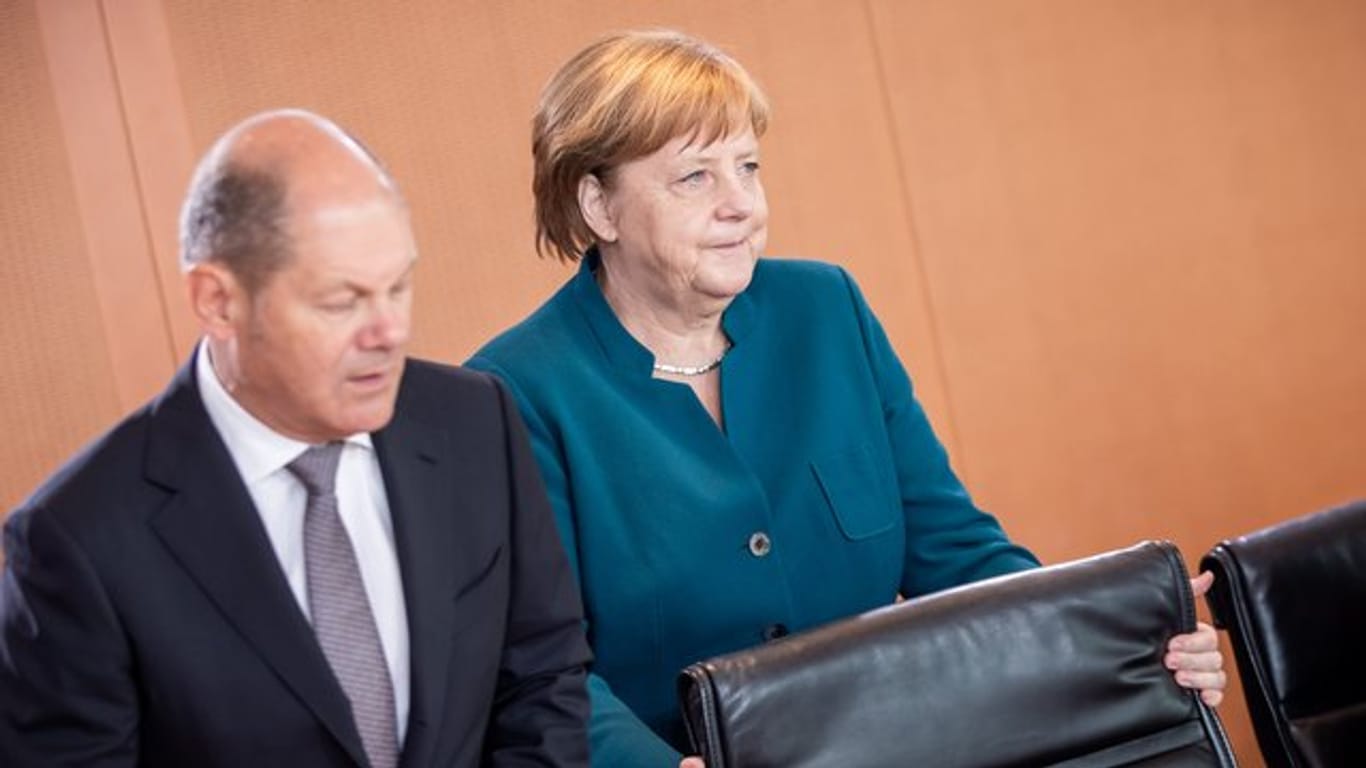 Bundesfinanzminister Scholz zusammen mit Bundeskanzlerin Merkel vergangene Woche vor einer Kabinetssitzung im Kanzleramt.