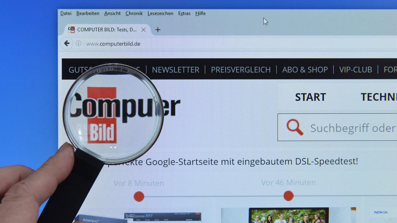 Eine Lupe wird über das Logo der "Computer Bild" gehalten: Der Verlag stellt die Zeitschrift "Computer Bild Spiele" ein.