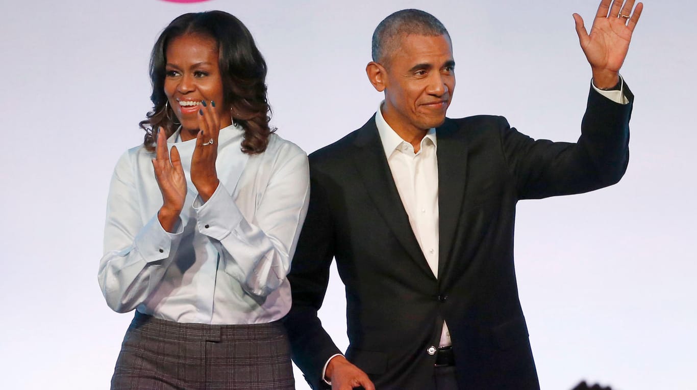 Barack und Michelle Obama: Ihre Produktionsfirma hat einen Vertrag mit dem Streamingdienst Spotify geschlossen.