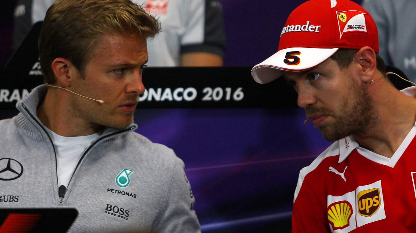 Konkurrenten auf der Strecke: Nico Rosberg (l.) und Sebstian Vettel waren zwischen 2006 und 2016 parallel in der Formel 1 als Fahrer aktiv.