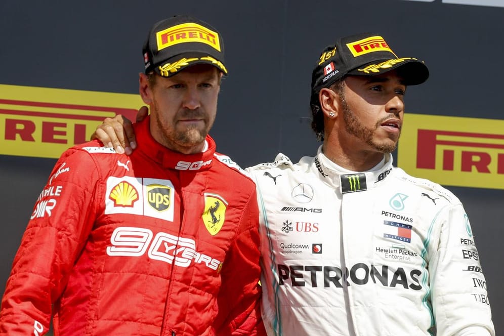 Nach seinem zweiten Platz in Montreal war Sebastian Vettel (links) mächtig angefressen, als er Lewis Hamilton zum Sieg gratulieren musste.