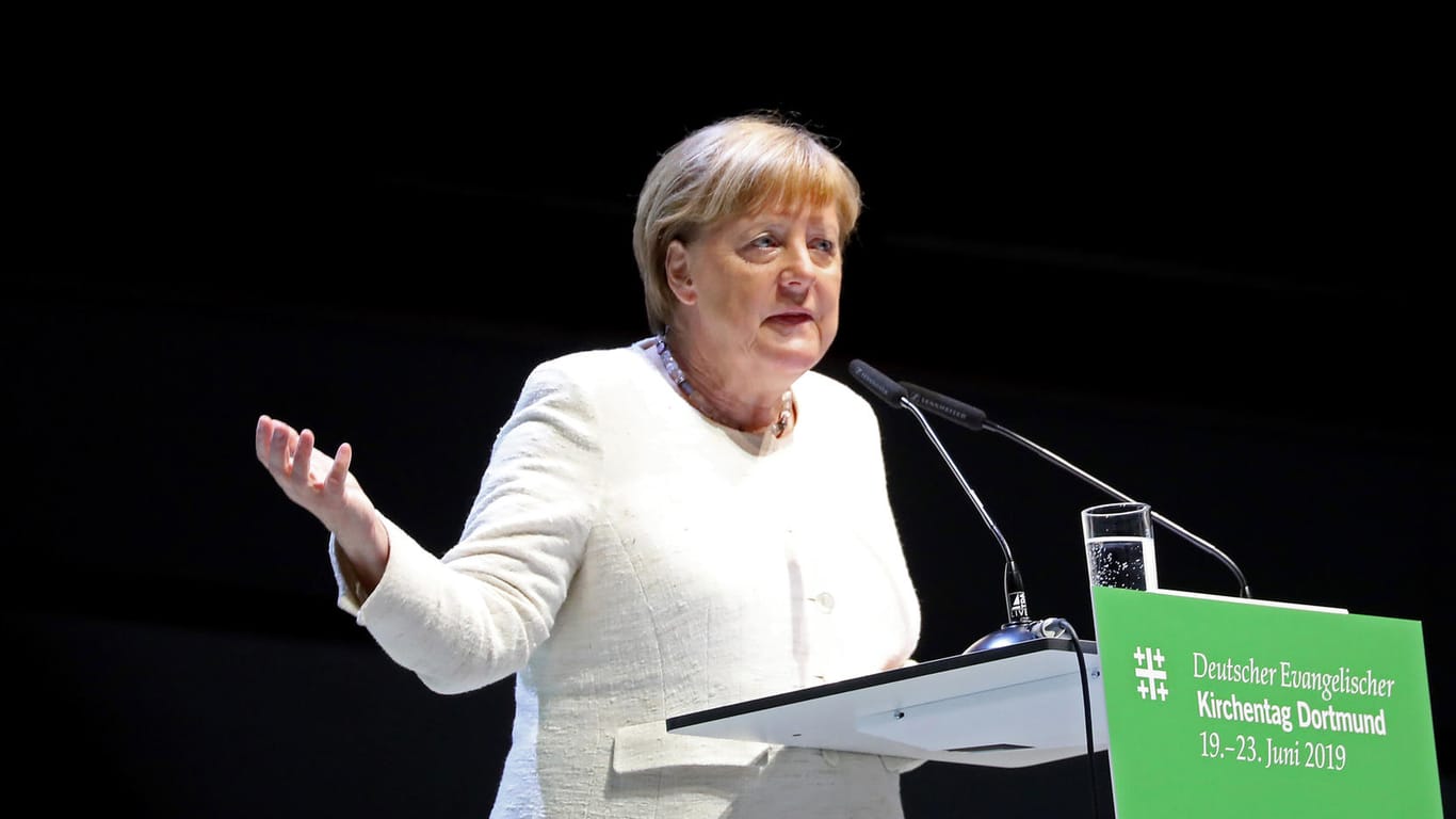 Bundeskanzlerin Angela Merkel (CDU) spricht auf dem evangelischen Kirchentag: Auch Trump kam bei ihrer Rede nicht gut weg.