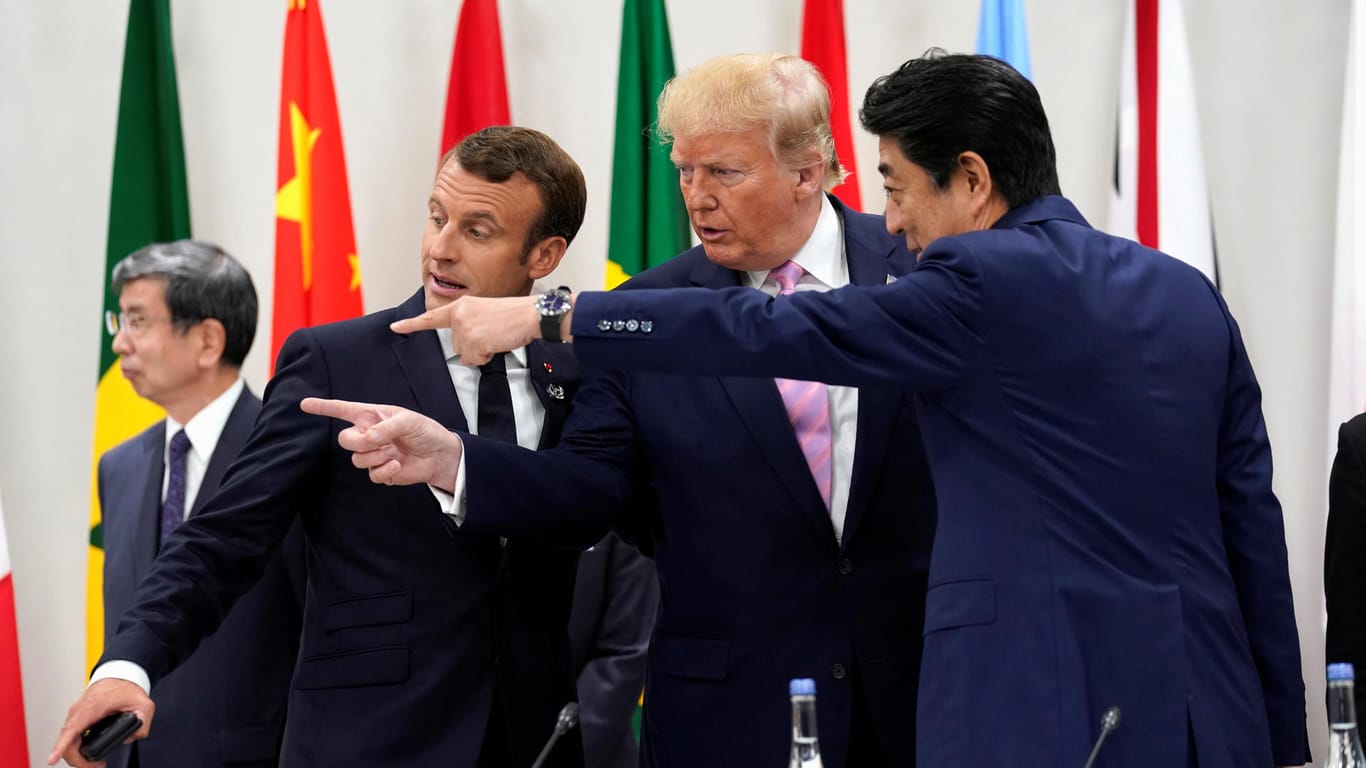 Macron, Trump und Abe beim Auftakt des Gipfeltreffens in Osaka.