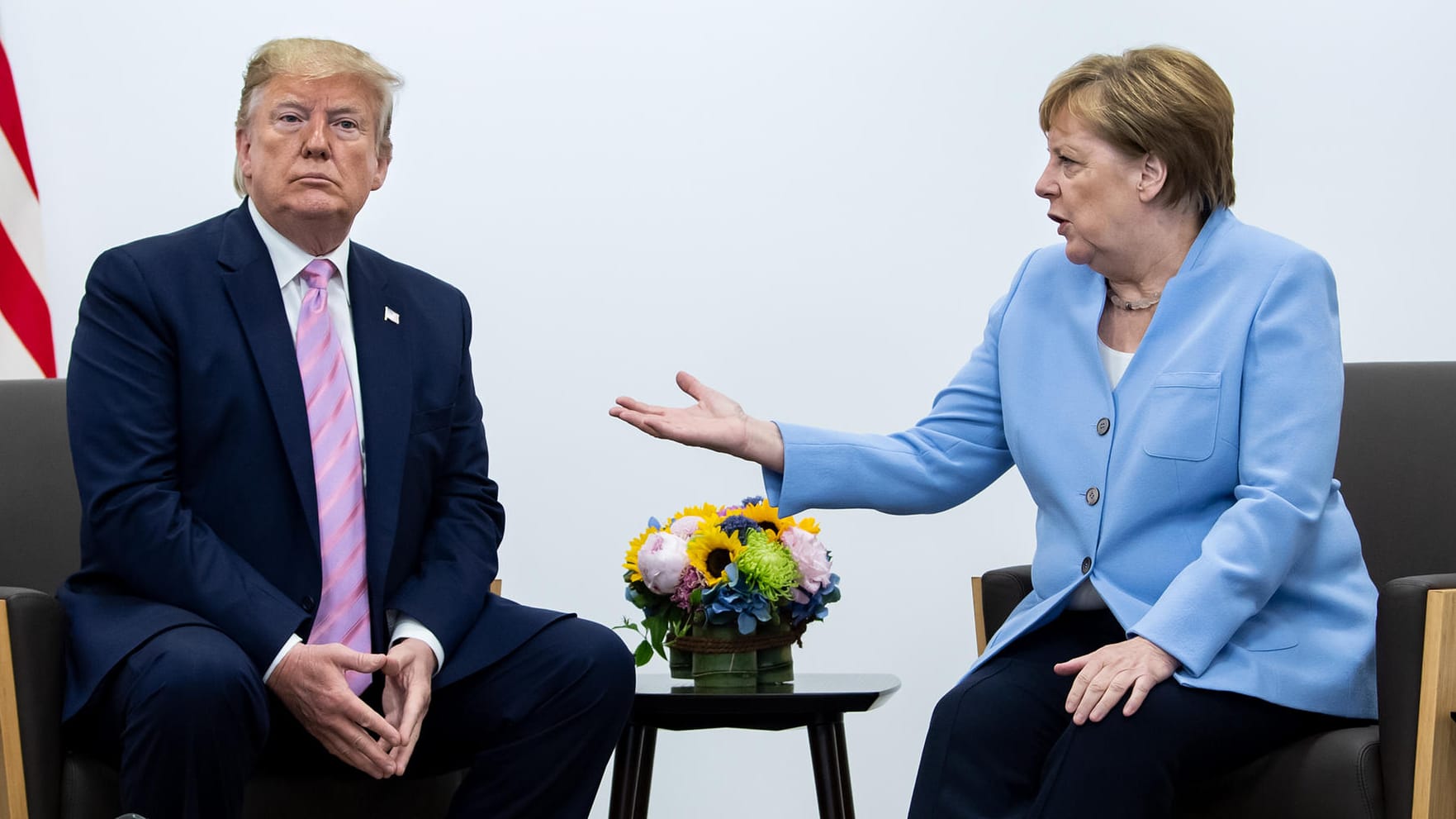 Donald Trump und Angela Merkel: Der US-Präsident ist nicht mehr der Einzige, der in Klima-Fragen auf die Bremse tritt. Die Abschlusserklärung des G20-Gipfels in Osaka steht auf der Kippe.