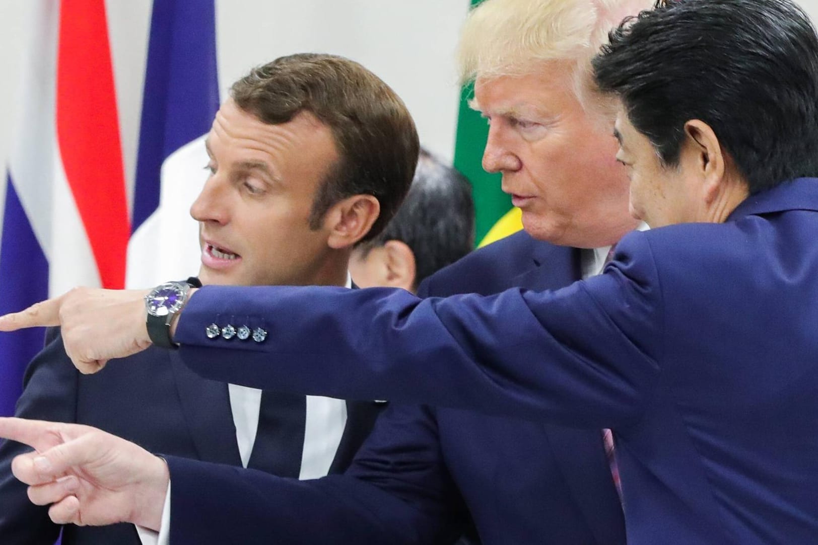 Frankreichs Präsident Emmanuel Macron, US-Präsident Donald Trump and Japans Premierminister Shinzo Abe: Sie konnten sich in Osaka nicht auf eine gemeinsame Richtung beim Klimaschutz einigen.