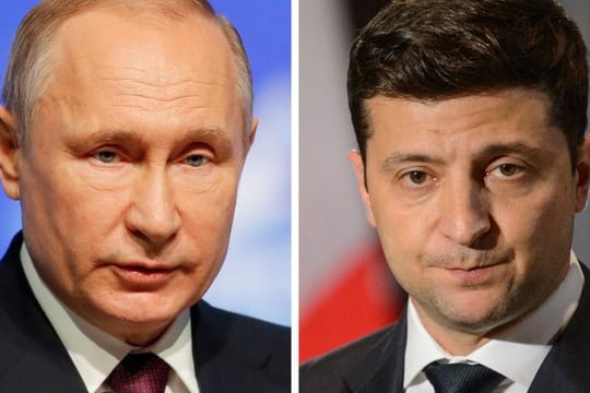Russlands Staatspräsident Wladimir Putin (l) und Wolodymyr Selenskyj, Staatspräsident der Ukraine.