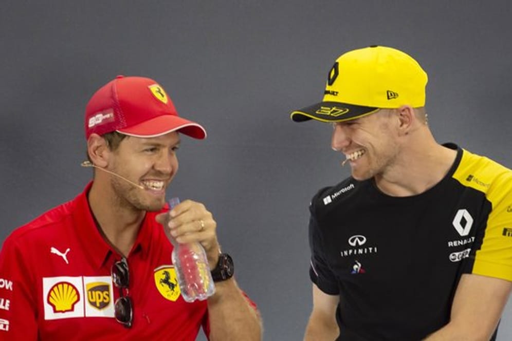 Gut gelaunt in Hockenheim: Nico Hülkenberg (r) und Sebastian Vettel.