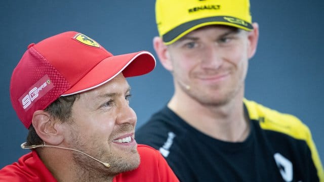 Vertreten die deutschen Farben in der Formel 1: Sebastian Vettel (l) und Nico Hülkenberg. Vertreten die deutschen Farben in der Formel 1: Sebastian Vettel (l) und Nico Hülkenberg.