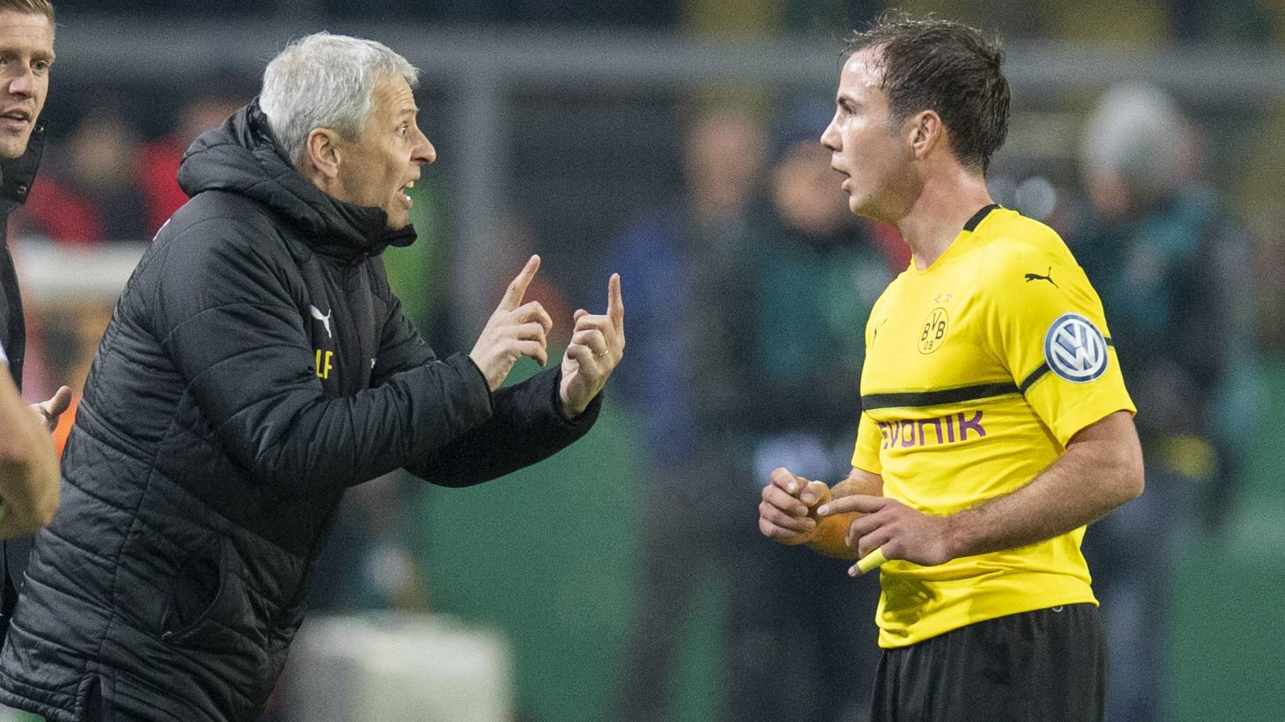 Brachte Mario Götze (r.) wieder auf Kurs: Lucien Favre (l.).