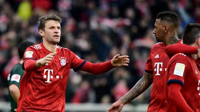 Würde beim FC Bayern gern weiter Jerome Boateng an seiner Seite haben: Thomas Müller (l). Würde beim FC Bayern gern weiter Jerome Boateng an seiner Seite haben: Thomas Müller (l).