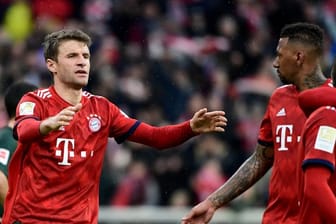 Würde beim FC Bayern gern weiter Jerome Boateng an seiner Seite haben: Thomas Müller (l).
