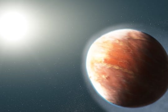 Die grafische Darstellung zeigt den Planeten, der wie ein American Football geformt sein soll und Metalle ins All schleudert.